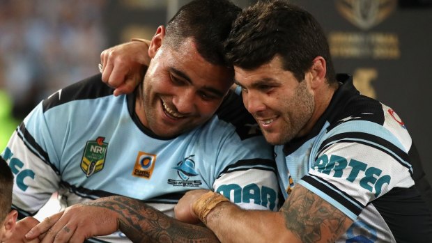 Special moment: Andrew Fifita celebrates the Sharks' premiership with Michael Ennis.