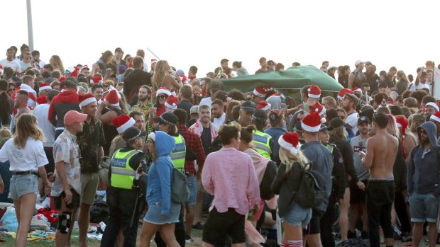 About 5000 revellers hit St Kilda foreshore on Christmas Day and left behind a big mess.