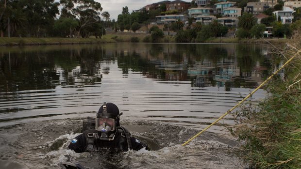 Police divers scour the Maribyrnong River for the body parts of Brendan Bernard in February 2015.