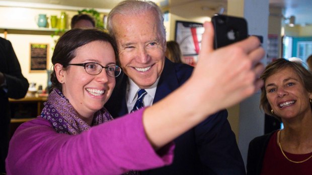 Former vice-president Joe Biden poses for a selfie.