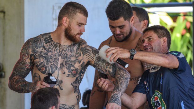 Patched up: Josh Dugan being fitted with a bio-patch on Wednesday.