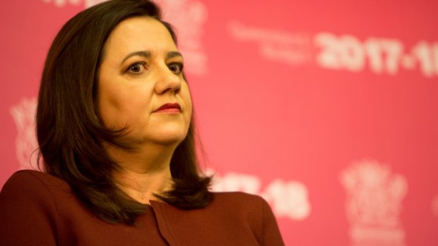 Premier Annastacia Palaszczuk was interrupted by protesters who chanted and later broke into song.