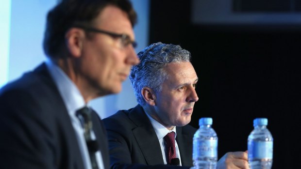 The pressure is on Telstra chief executive Andy Penn (right) to continue the strong performance of his predecessor, David Thodey (left).