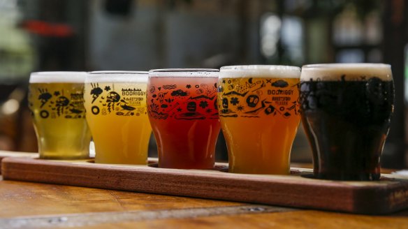 A tasting paddle of beer.