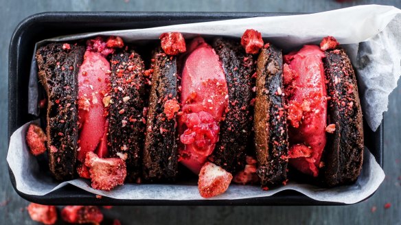 Brownie rounds sandwiching raspberry sorbet.