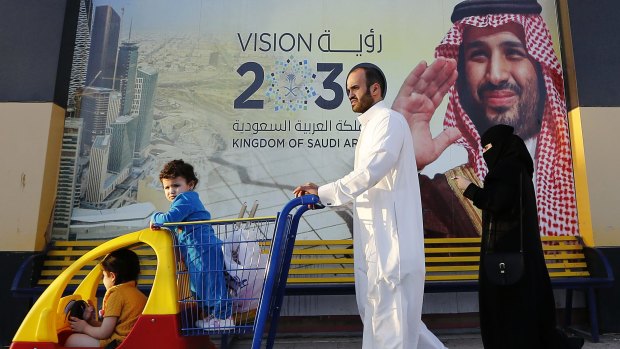 A banner showing Saudi Crown Prince Mohammed bin Salman, outside a mall in Jiddah, Saudi Arabia.