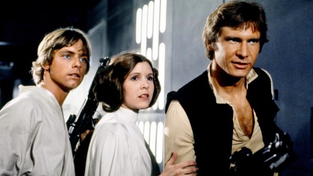 Mark Hamill, left, with Carrie Fisher and Harrison Ford in the original <i>Star Wars</i> film.
