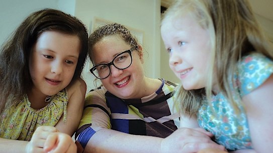 Jessica Doyle with daughters Ruby, 8, and Lily, 5, at their home in Preston. As a parent, "trying and failing is part of life," Ms Doyle says.
