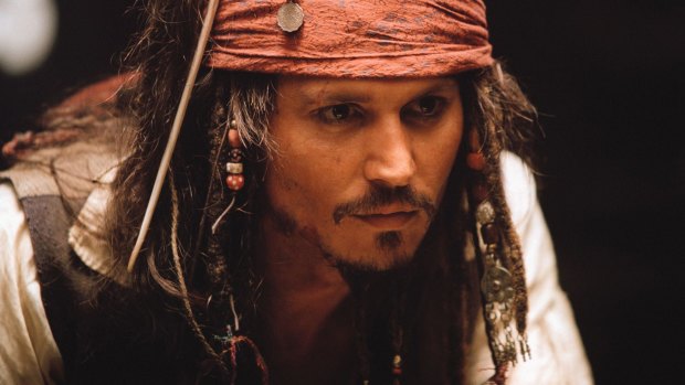 Johnny Depp as Captain Jack Sparrow.