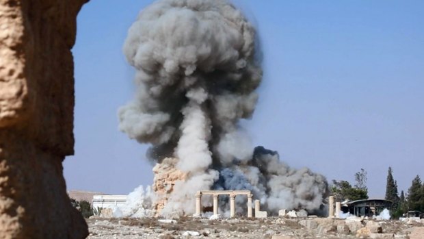 This undated photo released on August 25 on a social media site used by IS militants shows smoke from the detonation of the 2000-year-old temple of Baalshamin.