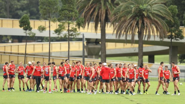 'That's a challenge for us and it's a challenge for the game': The Swans train on Tramway Oval, which coach John Longmire says is far from ideal.