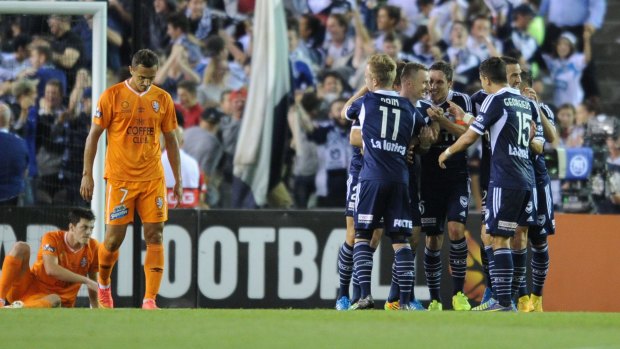Melbourne Victory celebrate getting on the scoreboard, even though none of them scored. 