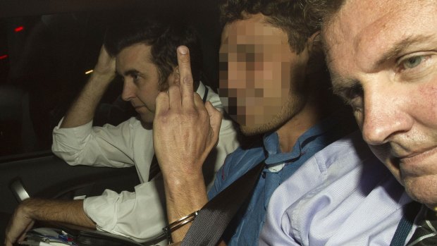 Sean Christian Price, centre, has been charged with raping a woman two days after murdering Masa Vukotic.