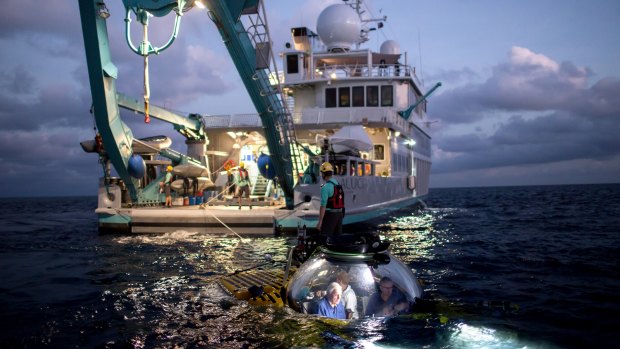 David Attenborough goes underwater in the Triton submersible near Osprey Reef.