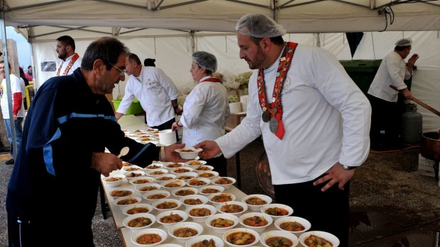 Making good use of "waste": Chefs serve a free meal made up of rejected produce in Greece.