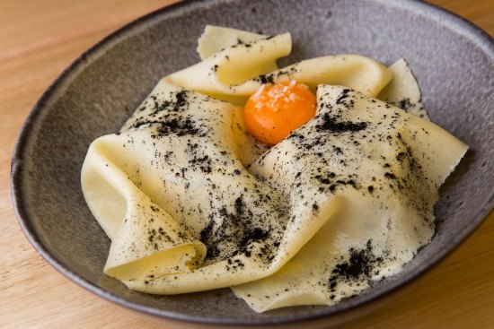 Vegetarian carbonara: Fazzoletti pasta with egg yolk and roast pumpkin.