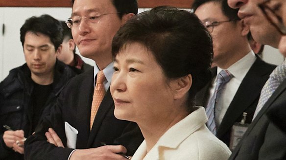 Impeached South Korean President Park Geun-hye listens to a reporter's question during a meeting with a selected group of reporters in January. 1, 2017. 