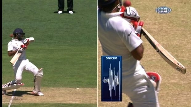 Grilled: Cheteshwar Pujara given out even though ball missed his bat.
