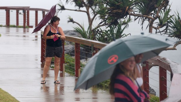 People watch the waves at Duranbah on the Gold Coast.