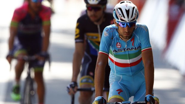 Vincenzo Nibali rolls across the stage six finish line after a crash.