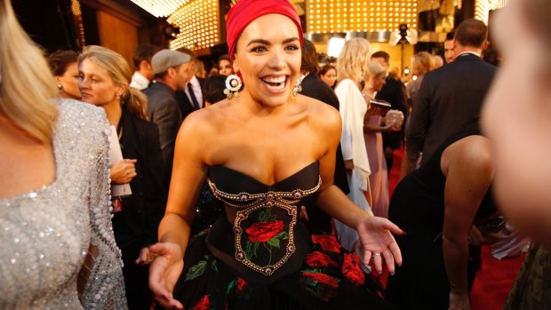 Divide and conquer ... Olympia Valance in a Spanish-themed ball gown.