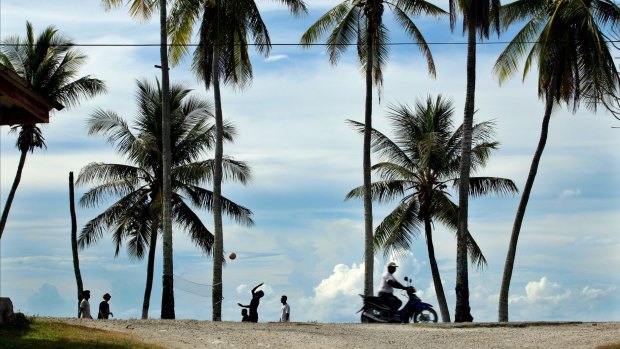 Asylum seekers get a recreation break away from the camp on Nauru.