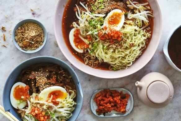 Ramyeon noodles with spicy broth, chilli beef and soft-boiled egg.