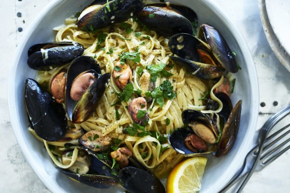 Remove half the mussels from their shells for easy eating.