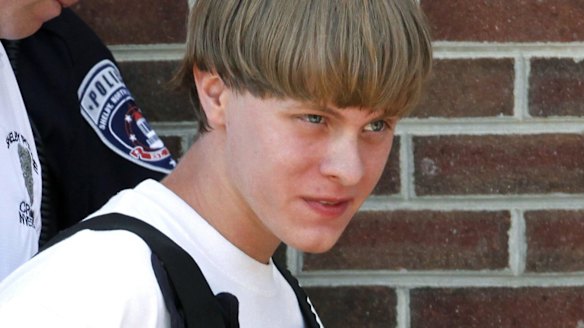 Arrested: Alleged gunman Dylann Roof.