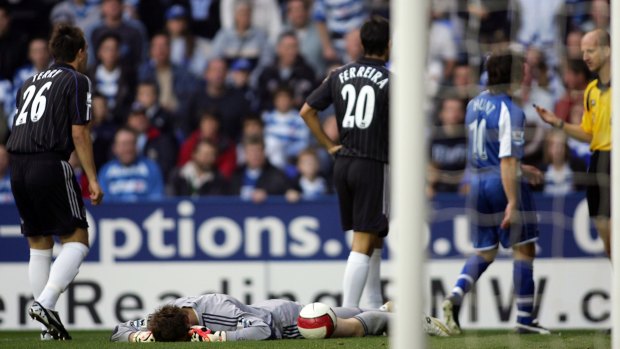 Infamous incident: Cech lies injured after a clash with Stephen Hunt of Reading in 2006.