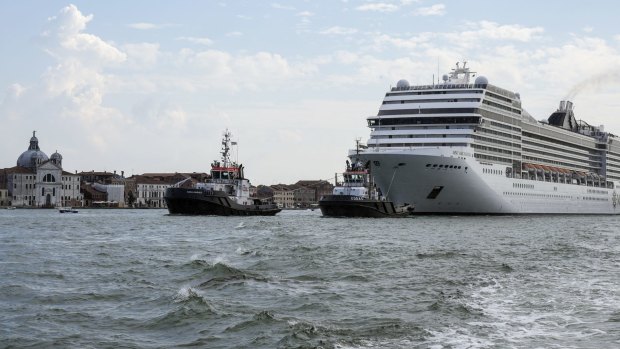 The MSC Orchestra cruise ship in Venice last month. The 92,000-tonne, 16-deck ship was the first to sail into the city since the pandemic shut down the cruising industry.