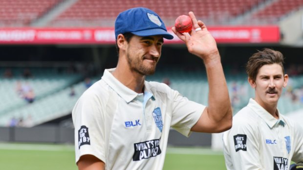 Not a fan: Mitchell Starc acknowledges the crowd after taking 8-73 with the pink ball - but says it can still be difficult to bowl with.