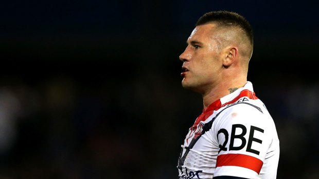 Let go: Shaun Kenny-Dowall of the Roosters.