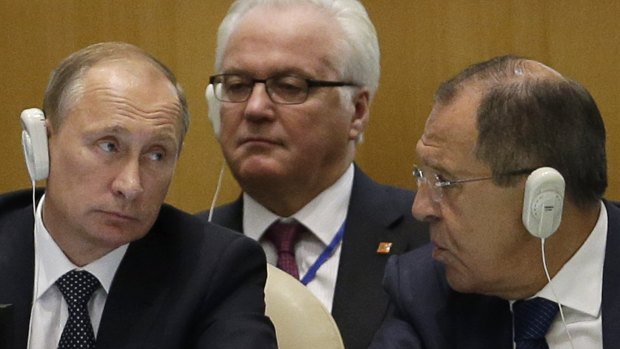 Russian President Vladimir Putin (left) with Russia’s UN ambassador, Vitaly Churkin (centre), and Foreign Minister Sergey Lavrov at the UN. 