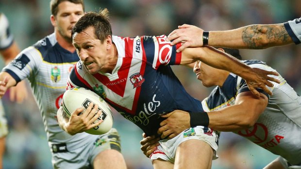 Determined: Mitchell Pearce finds space at Allianz Stadium.