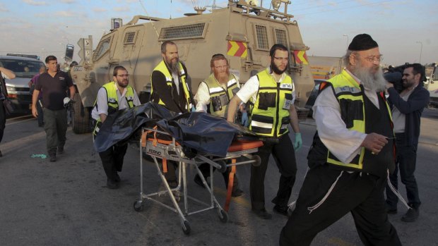 Israeli emergency services respond to an attack near the West Bank Gush Etzion settlements.