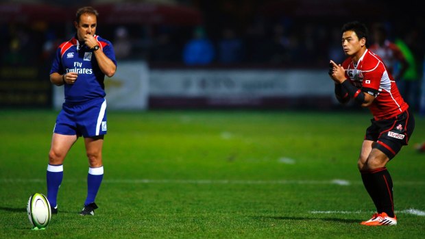 Goalkicker: Japan fullback Ayumu Goromaru lines up a shot at goal against Romania.