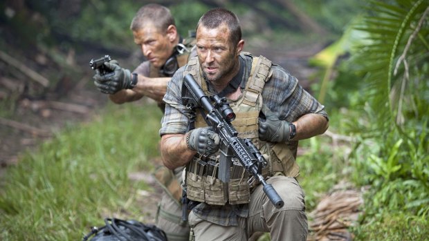 With Phillip Winchester, left, in <i>Strike Back</i>.