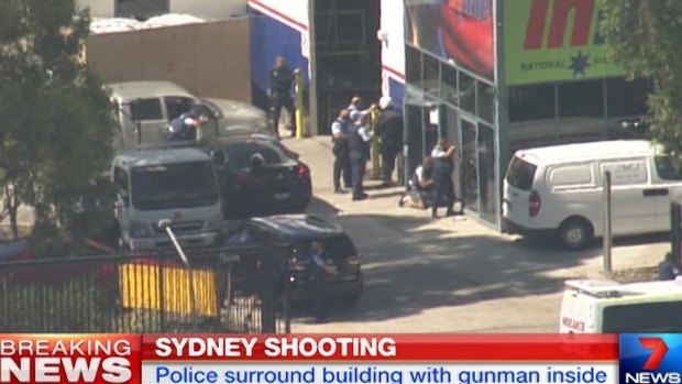 Police surround Inline National Signage in Ingleburn.