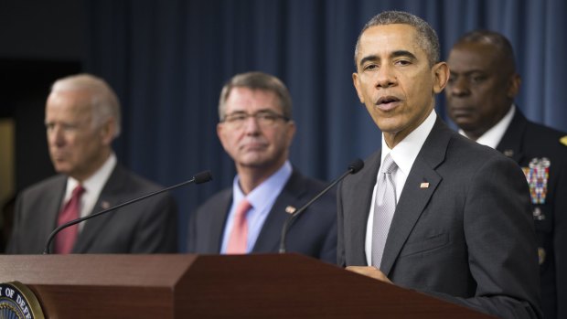 President Barack Obama, flanked by, from left, Vice President Joe Biden, Defence Secretary Ash Carter and Commander of US Central Command General Lloyd Austin, at the Pentagon on Monday. 