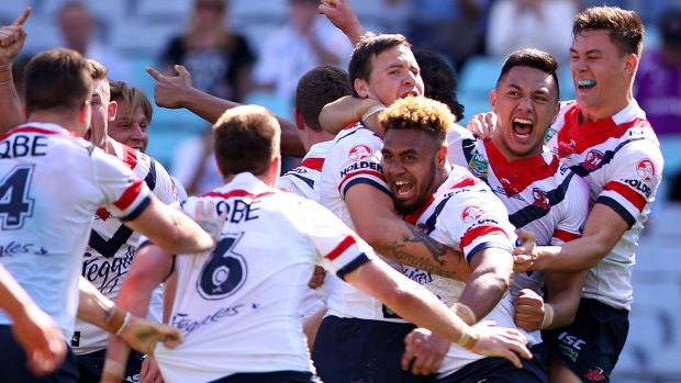 Comeback kings: The Roosters celebrate their extraordinary victory over the Panthers under-20s side in the Holden Cup grand final.