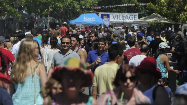 Crowds flock to City Walk for the festival on Sunday.