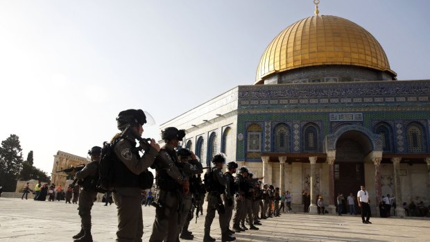Israeli border police officers stand near the Dome of the Rock  in the al-Aqsa Mosque compound in Jerusalem's Old City.