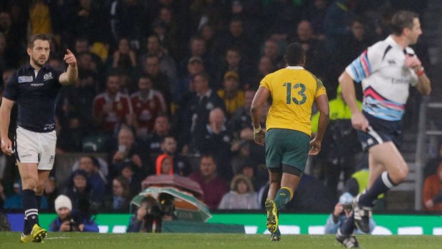 Frantic: Scotland captain Greig Laidlaw, left, points as South African referee Craig Joubert, right, runs off the pitch after blowing the final whistle.