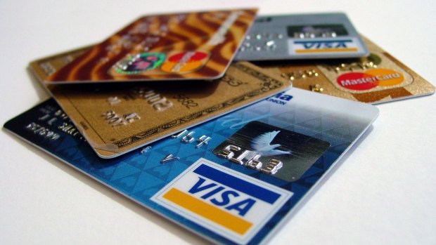 The big banks are all trimming their credit card reward programs but fees are rising.