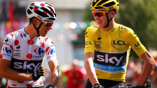 Brilliant sunshine: Chris Froome (R) with Richie Porte at the start line.