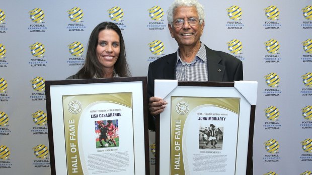 SYDNEY, AUSTRALIA - NOVEMBER 16:  Former Matilda Lisa Casagrande and former Socceroo John Moriarity pose after being inducted into the FFA Hall of Fame during the Football Federation Australia Hall of Fame induction ceremony and recognition of 1965 Socceroos at the FFA Offices on November 16, 2015 in Sydney, Australia.  (Photo by Mark Metcalfe/Getty Images)