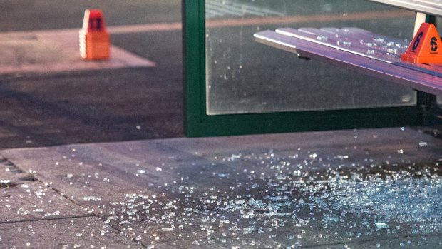 Shattered glass at the scene of the shooting.