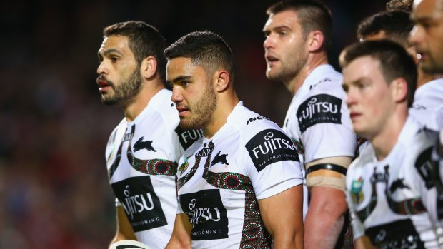 No answers: Rabbitohs players look shell-shocked after their hammering.