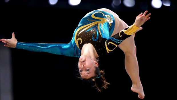 Silver medallist Mary Anne Monckton of Australia competes in the beam.